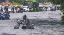 Streets flooded following heavy rainfall in Delhi