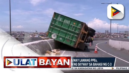 Isang container van na may lamang PPEs, tumagilid sa bahagi ng C-3