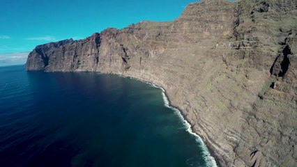 Drone flying beautiful nature's Los Gigantes - 4K