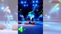 Şarkıcı Sefo, konser sırasında sahneye atlayan hayranlarından kaçtı