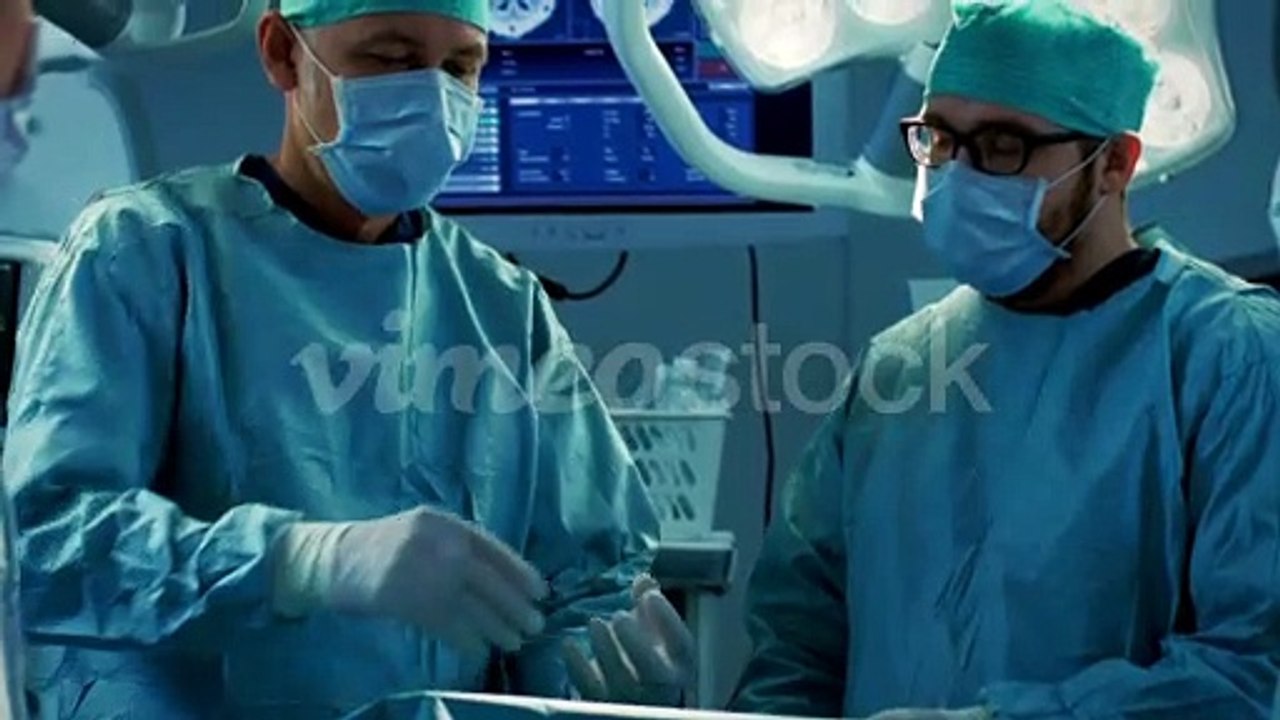 Surgeons_Perform_Brain_Surgery_Using_Augmented_Reality,_Animated_3D_Brain._High_Tech_Technologically_Advanced_Hospital._Futurist