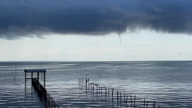 Waterspout descends from the clouds near Alabama
