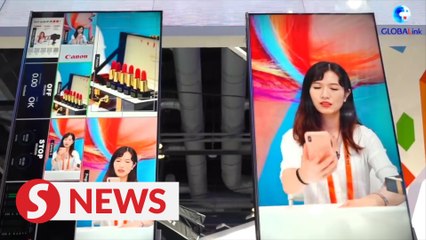 Vlog: Dance to charge your phone at China's services trade fair