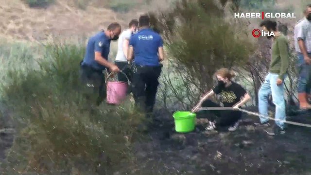 İstanbul Büyükçekmece'de otluk alandaki yangın yerleşim alanlarına yaklaşınca panik yarattı
