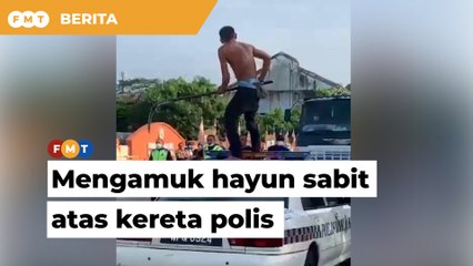 Lelaki mengamuk hayun sabit atas kereta polis ditahan