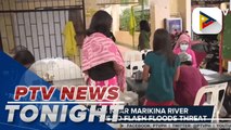 Residents near Marikina River evacuated due to flash floods threat; COVID-19 vaccinations in some areas in NCR put off due to flooding
