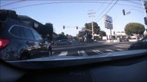 Car Runs Red Light, Narrowly Misses Traffic