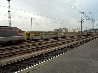 départ de l'um de rio jaune tracté par la bb 67000 multi