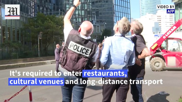 'Spider-man' scales skyscraper in protest at French Covid pass
