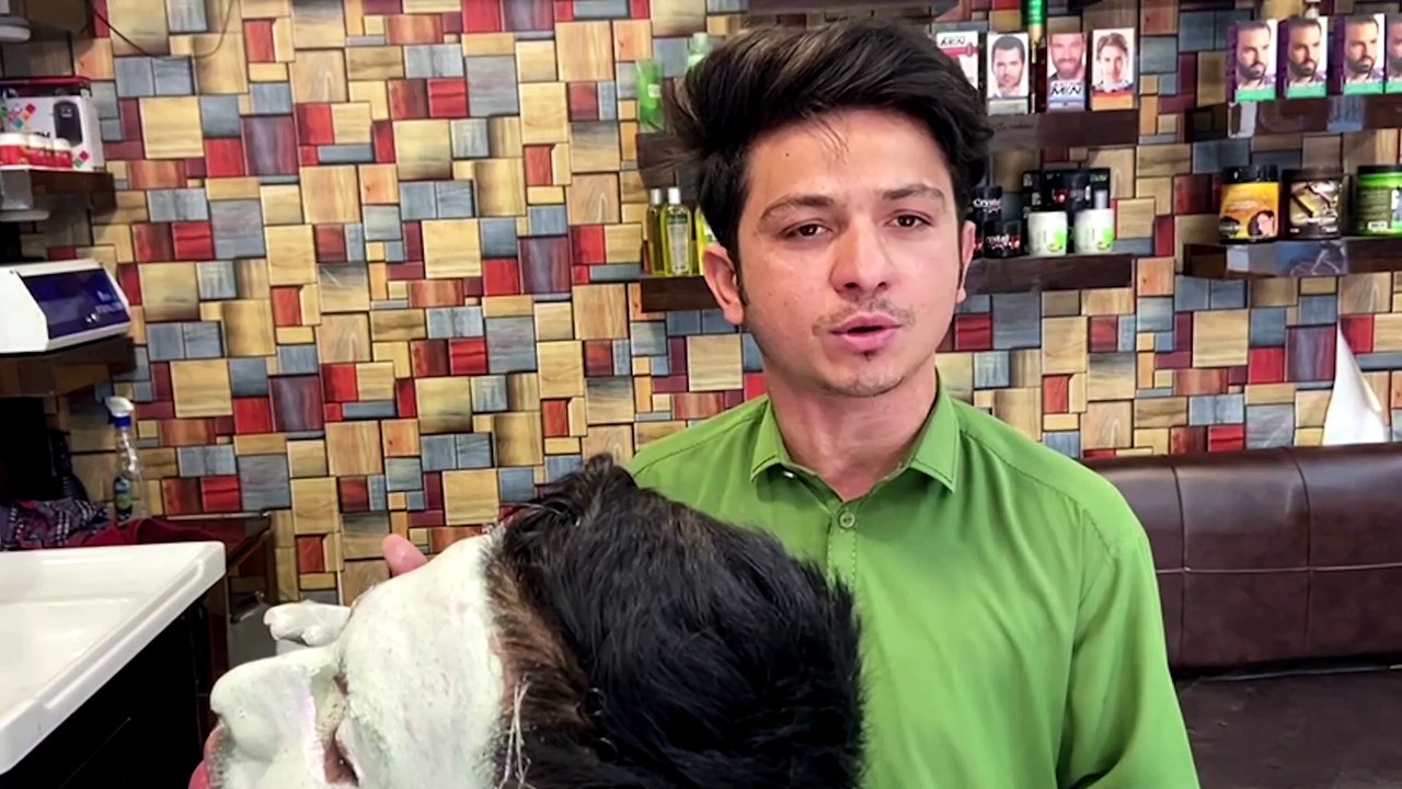 Barbers unsure on future as more grow beards following Taliban takeover