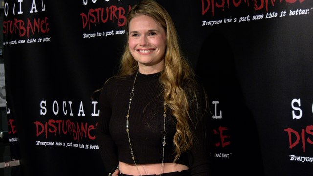 Actress Meredith Jackson attends the Social Disturbance private screening red carpet in Los Angeles