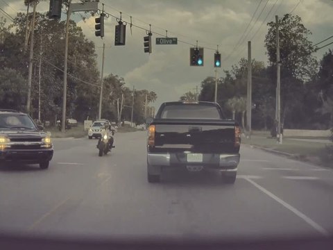 Motorcycle Rips Bumper Bar Clean off Car in Extremely Close Call