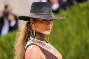 Download Video: Jennifer Lopez Wore a Cowboy Hat With a Low-Cut, Thigh-Slit Gown at the Met Gala