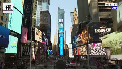 Visitors and New-Yorkers reminisce about 9-11 in Times Square