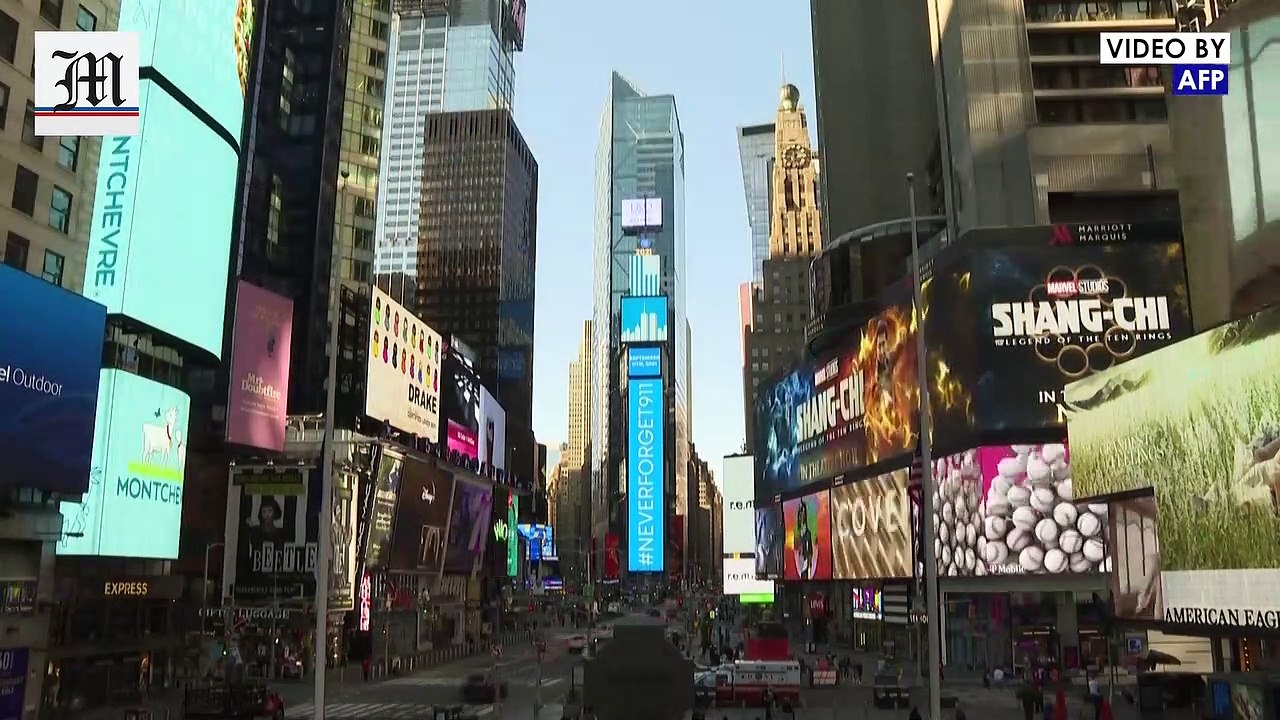 Visitors and New-Yorkers reminisce about 9-11 in Times Square