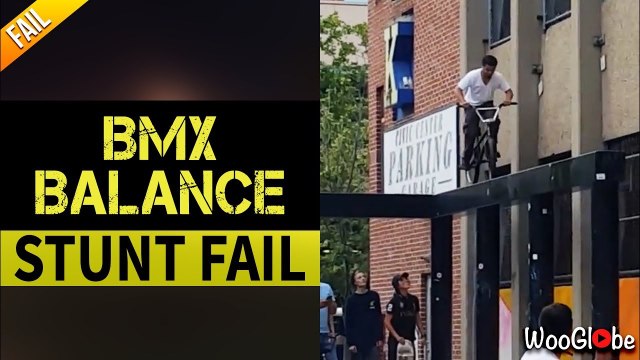 'BMX STUNT FAIL - Biker FALLS OFF Elevated Structure & Face-Plants on Ground'