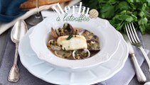 Merlu à l'étouffée, palourdes et petits pois