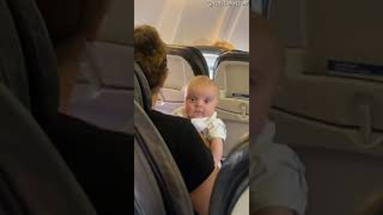 Baby's Got an Intense Glare on Airplane