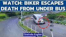 Gujarat: A biker miraculously escapes death after seemingly fatal accident in Dahod | Oneindia News