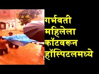 Watch: Family members carry pregnant woman on cot to hospital