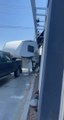 Guy Accidentally Smashes Trailer Attached to His Pick up Truck While Making Turn at Drive-Thru