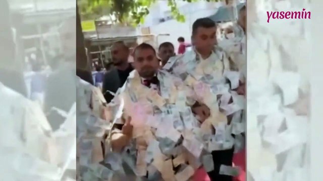 Aşiret düğününde damada takılan parayı 4 kişi zor taşıdı