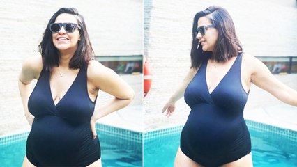 Neha Dhupia Flaunts Her Baby Bump In A Swimsuit