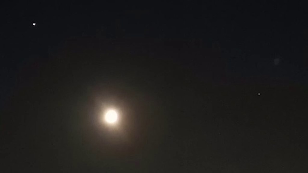 Jupiter, Saturn and moon form triangle in the sky
