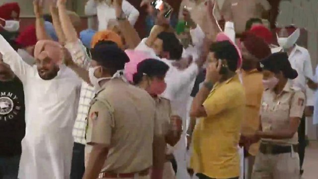 Supporters of Channi celebrates outside his residence