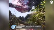 Balão cai sobre casas e fios de energia em Cariacica