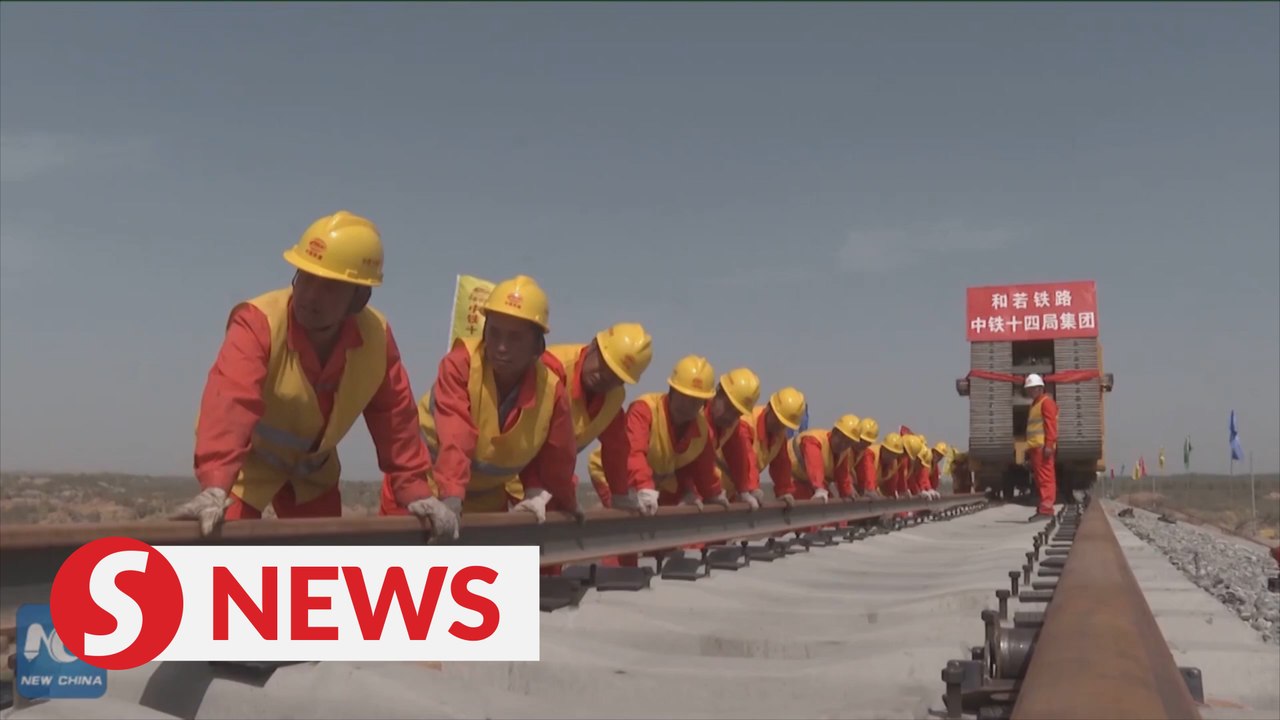 Track-laying work for major railway in China's Xinjiang completed