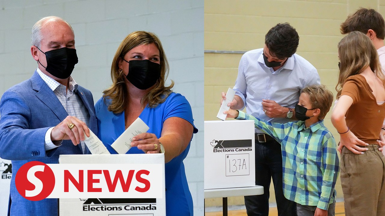Trudeau in tight race with rival as Canadians vote