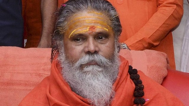 What is the death mystery of high profile saint Mahant Giri?
