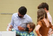 Trudeaus hopes for a decisive win hang by a thread as Canadians vote