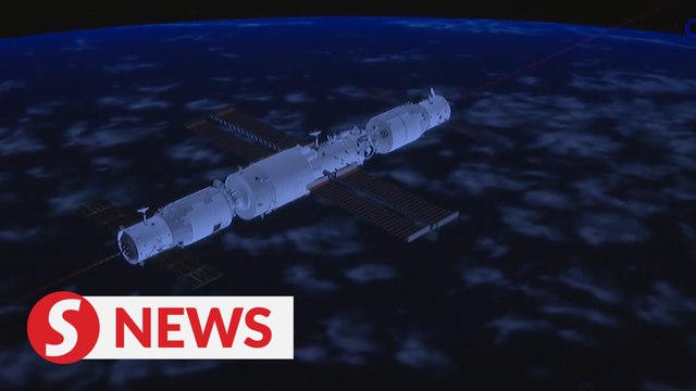 China's cargo craft docks with space station core module