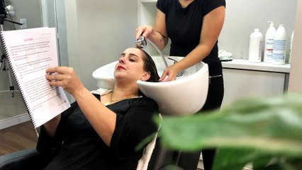 Shampooing at Salon Gets Cut Short
