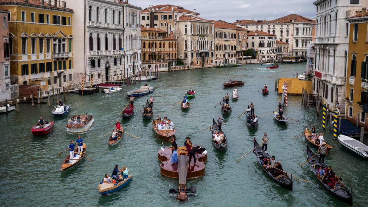 This 39-Foot Violin-Shaped Boat Floated Down Venice's Grand Canal With a String Quartet on Board