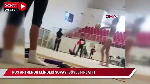 Rus antrenör elindeki sopayı sporcuya fırlattı