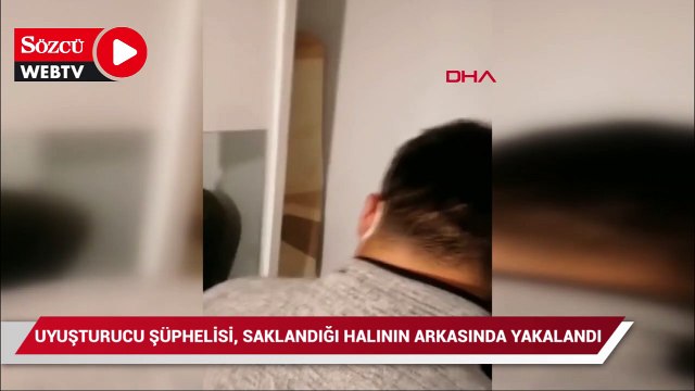 Uyuşturucu madde ticaretinden aranan şüpheli, saklandığı halının arkasında yakalandı