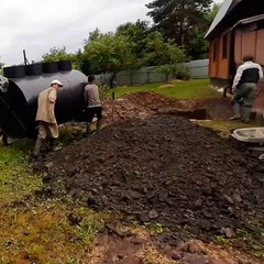 Worker Takes a Tumble While Carrying Equipment