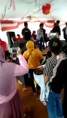 The action of small children taking part in a dance cohesiveness competition in commemoration of the independence day of the republic of Indonesia