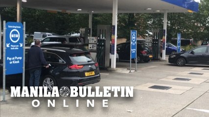 Drivers queue for petrol in the UK over shortage concerns
