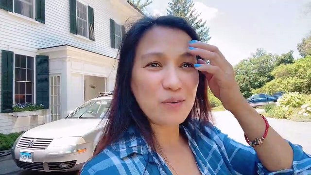 Lady Confronts Bear Going Through Garbage