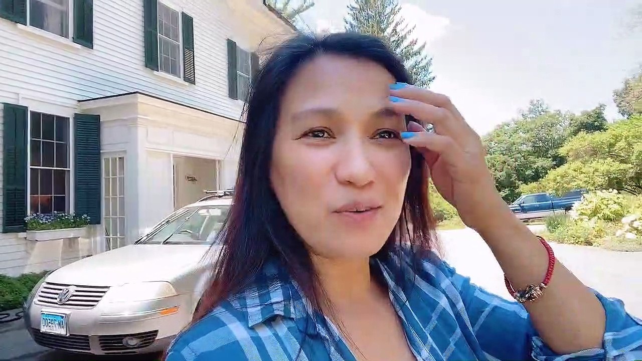 Lady Confronts Bear Going Through Garbage