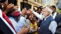 PM Modi meets crowd gathered outside hotel in New York