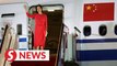 China welcomes Huawei executive home