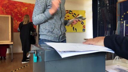 Allemagne : paroles d'électeurs, venus nombreux dès l'ouverture du bureau de vote