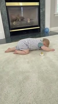 Baby Crawls Face First Across the Floor