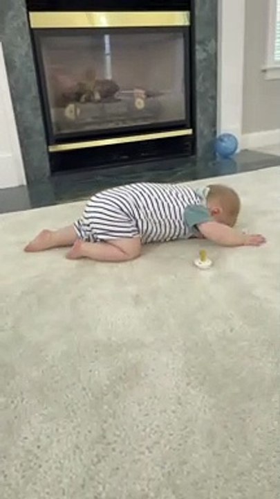 Baby Crawls Face First Across the Floor