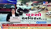 Ahmedabad Rains _ BRTS bus gets stuck in pothole near Shashtrinagar cross roads , traffic jam _ Tv9
